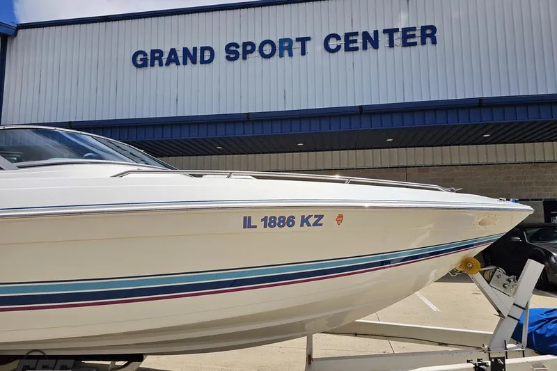 Slide: The Image of 1997 Formula 252 SS boat at Grand Sport Center, displayed on a trailer. - 8