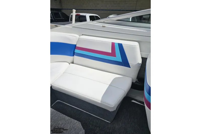 Slide: The Image of White and blue seating in 1997 Formula 252 SS boat interior. - 92