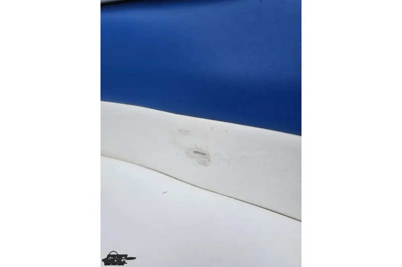 Slide: The Image of Blue and white boat seat with a stain, Formula 252 SS, 1997 model. - 95