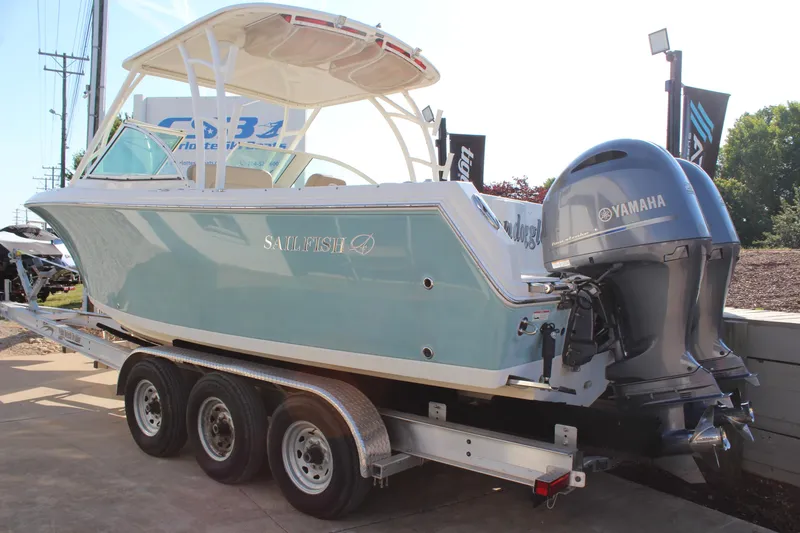 Slide: The Image of 2017 Sailfish 275 DC boat on trailer with Yamaha outboard motor. - 5