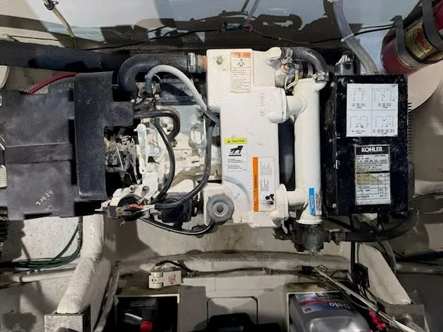 Slide: The Image of Engine compartment of a 1984 Bertram 30 with Kohler generator. - 26