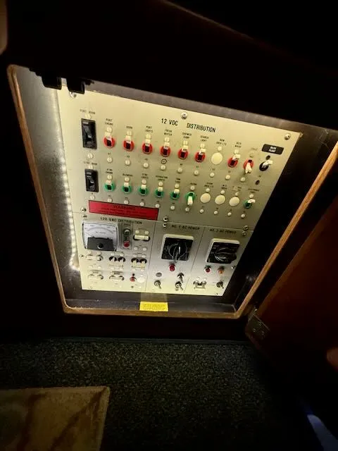 Slide: The Image of Electrical control panel of a 1984 Bertram 30 boat. - 27