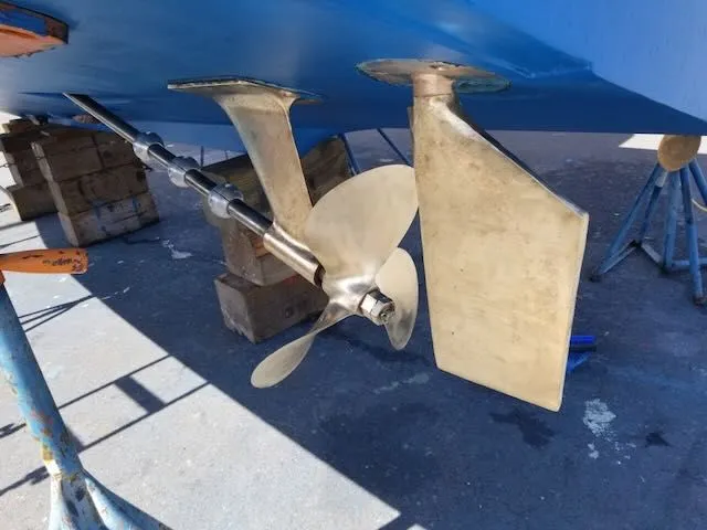 Slide: The Image of Propeller and rudder of a 1984 Bertram 30 boat. - 30