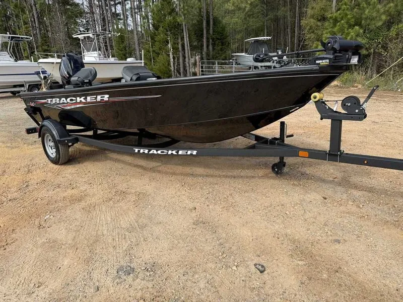 Slide: The Image of Tracker Super Guide V16 Tiller w/ Mercury 40 Trailer 2025 - 6