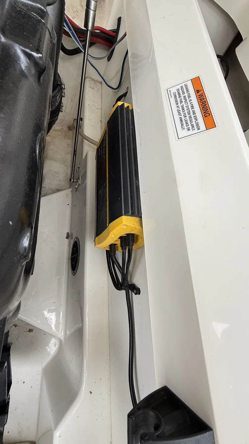 Slide: The Image of Interior view of a 2021 Sea Ray SDX250 boat engine. - 11