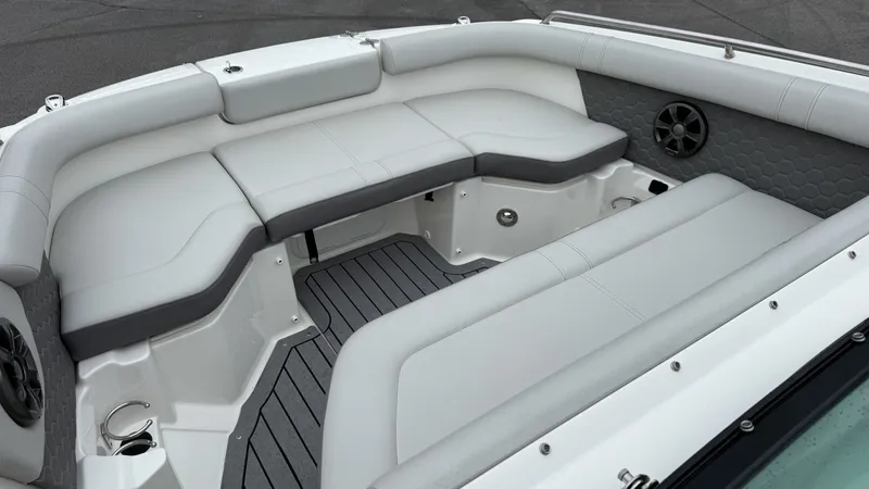 Slide: The Image of Interior of 2021 Sea Ray SDX250 boat with gray upholstery. - 14