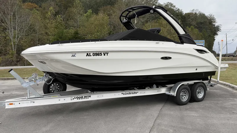 Slide: The Image of 2021 Sea Ray SDX250 boat on trailer, side view. - 17