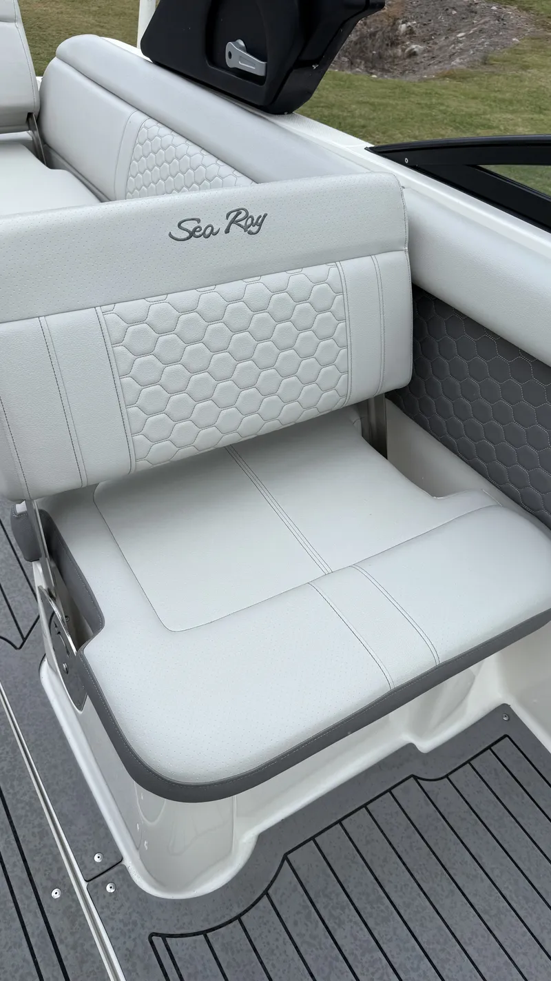 Slide: The Image of 2021 Sea Ray SDX250 boat seat with hexagonal pattern. - 2