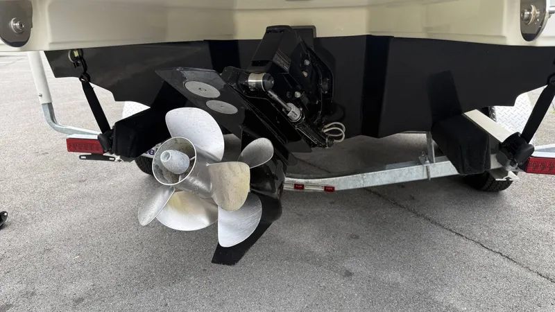 Slide: The Image of Rear view of a 2021 Sea Ray SDX250 boat with propeller. - 6