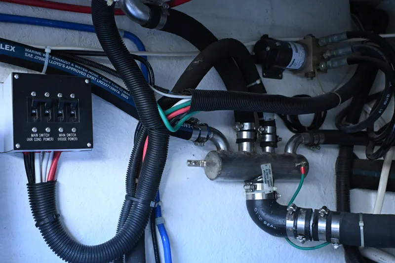 Slide: The Image of Electrical and plumbing system in a 1999 McKinna 47 Sedan yacht. - 48