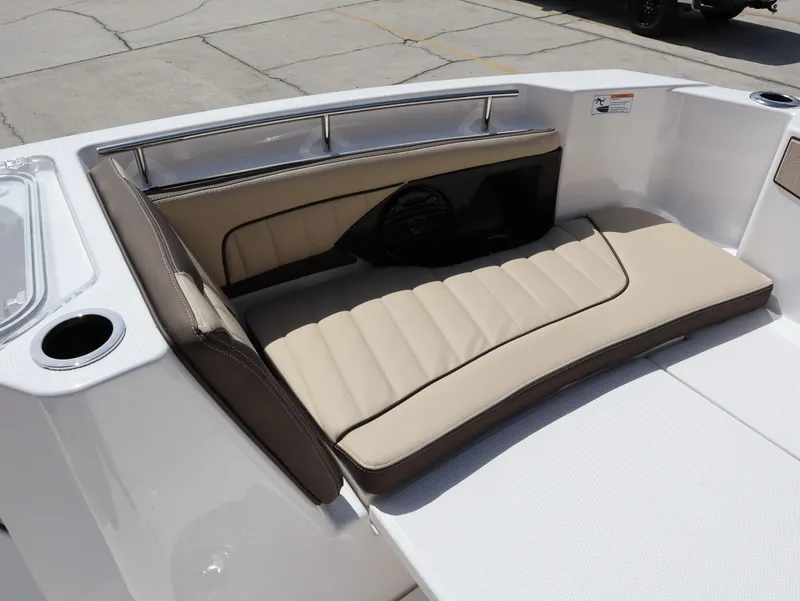 Slide: The Image of Interior of Yamaha Boats 255 FSH Sport H 2026 with beige seating. - 15