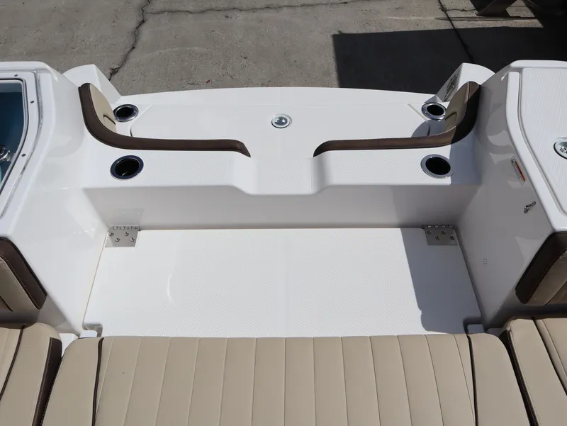 Slide: The Image of Yamaha Boats 255 FSH Sport H 2026, seating area with cup holders. - 19