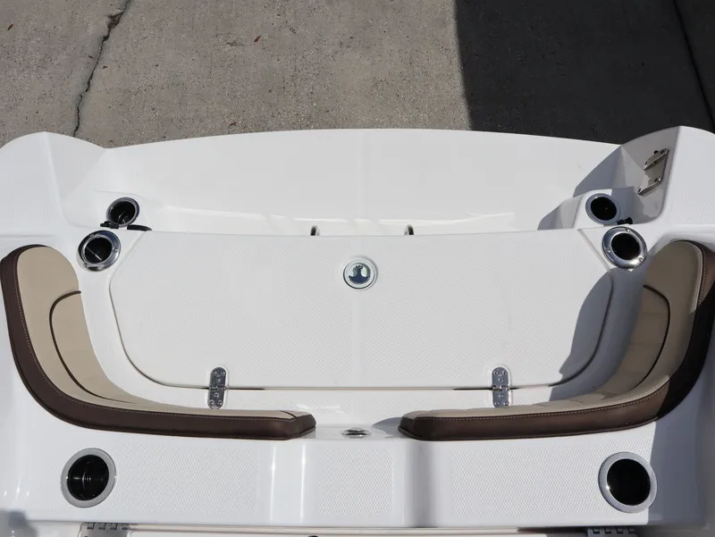 Slide: The Image of Yamaha Boats 2026 255 FSH Sport H, rear seating area with cup holders. - 20