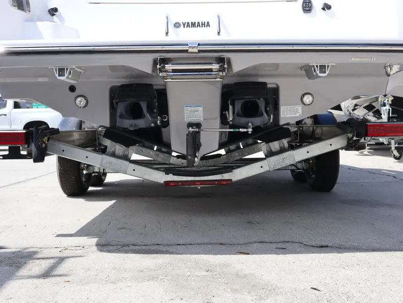 Slide: The Image of Rear view of 2026 Yamaha 255 FSH Sport H boat on trailer. - 8