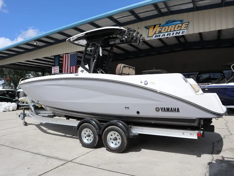 Slide: The Image of 2026 Yamaha 255 FSH Sport H boat on trailer at VForce Marine. - 9
