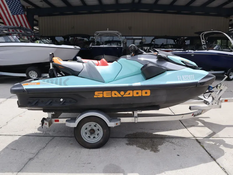 Slide: The Image of 2022 Sea-Doo GTI SE 170 jet ski on trailer, side view. - 2