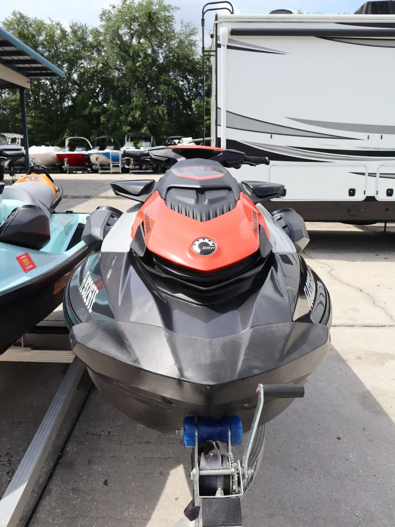 Slide: The Image of 2022 Sea-Doo GTI 130 jet ski parked on trailer. - 4
