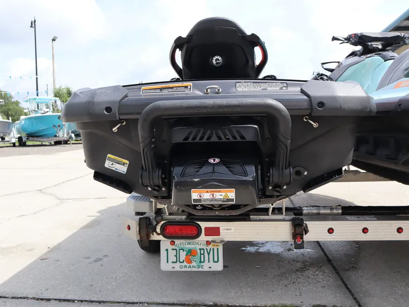 Slide: The Image of Rear view of a 2022 Sea-Doo GTI 130 on a trailer. - 8