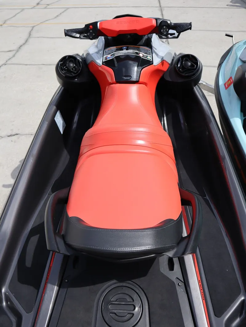 Slide: The Image of 2022 Sea-Doo GTI 130 jet ski with red seat, top view. - 9