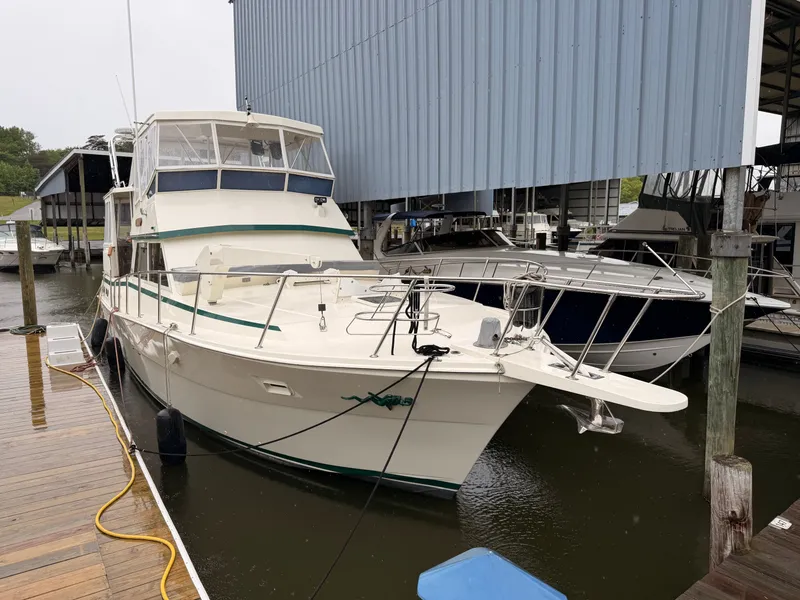 The Image of 1987 Viking DBL Cabin Motor Yacht docked at marina. - 0