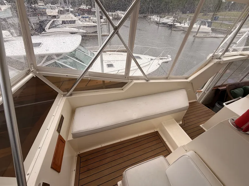 Slide: The Image of Interior view of a 1987 Viking DBL Cabin Motor Yacht in harbor. - 12