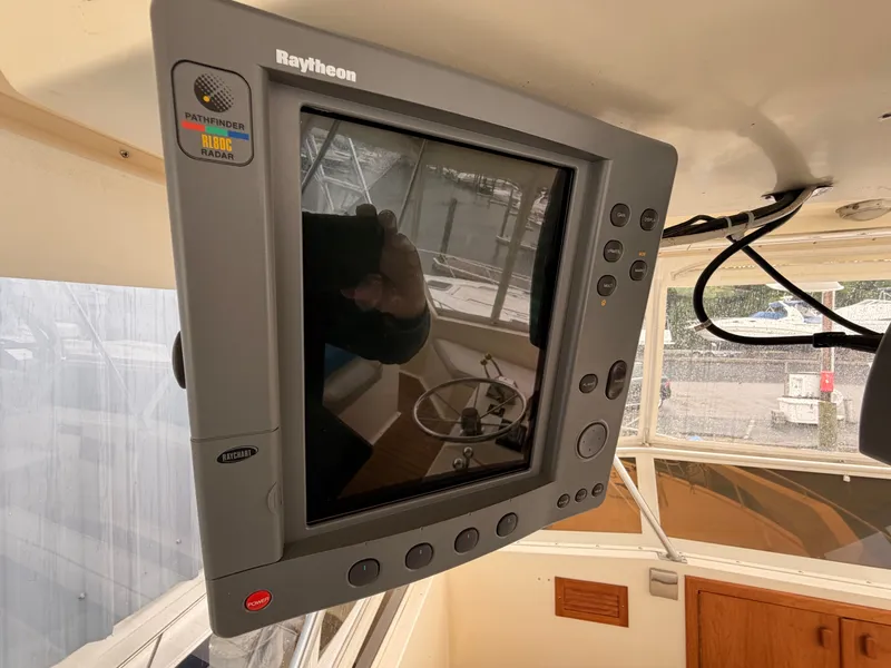 Slide: The Image of Raytheon radar on 1987 Viking DBL Cabin Motor Yacht. - 22