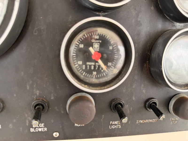 Slide: The Image of Dashboard of a 1987 Viking DBL Cabin Motor Yacht. - 25