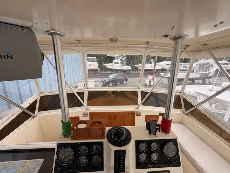 Slide: The Image of Interior view of a 1987 Viking DBL Cabin Motor Yacht cockpit. - 28