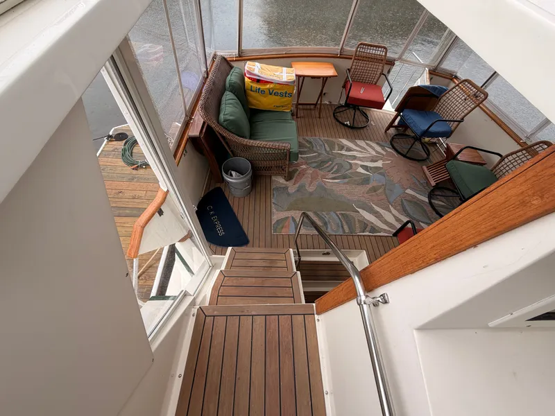 Slide: The Image of Interior of a 1987 Viking DBL Cabin Yacht with seating area. - 30