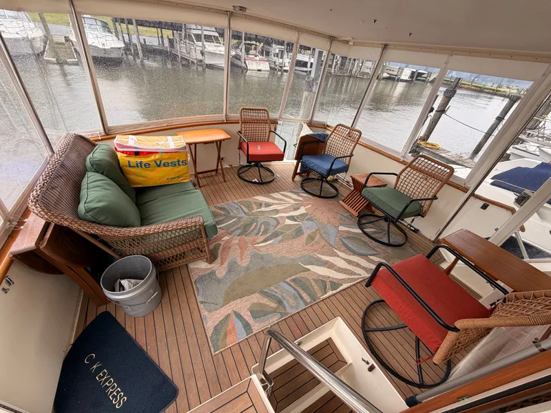 Slide: The Image of Interior of a 1987 Viking DBL Cabin Yacht with seating area. - 31