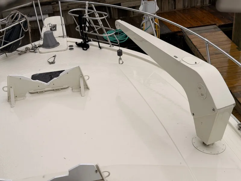 Slide: The Image of Viking DBL Cabin Motor Yacht 1987 deck view with anchor winch. - 9