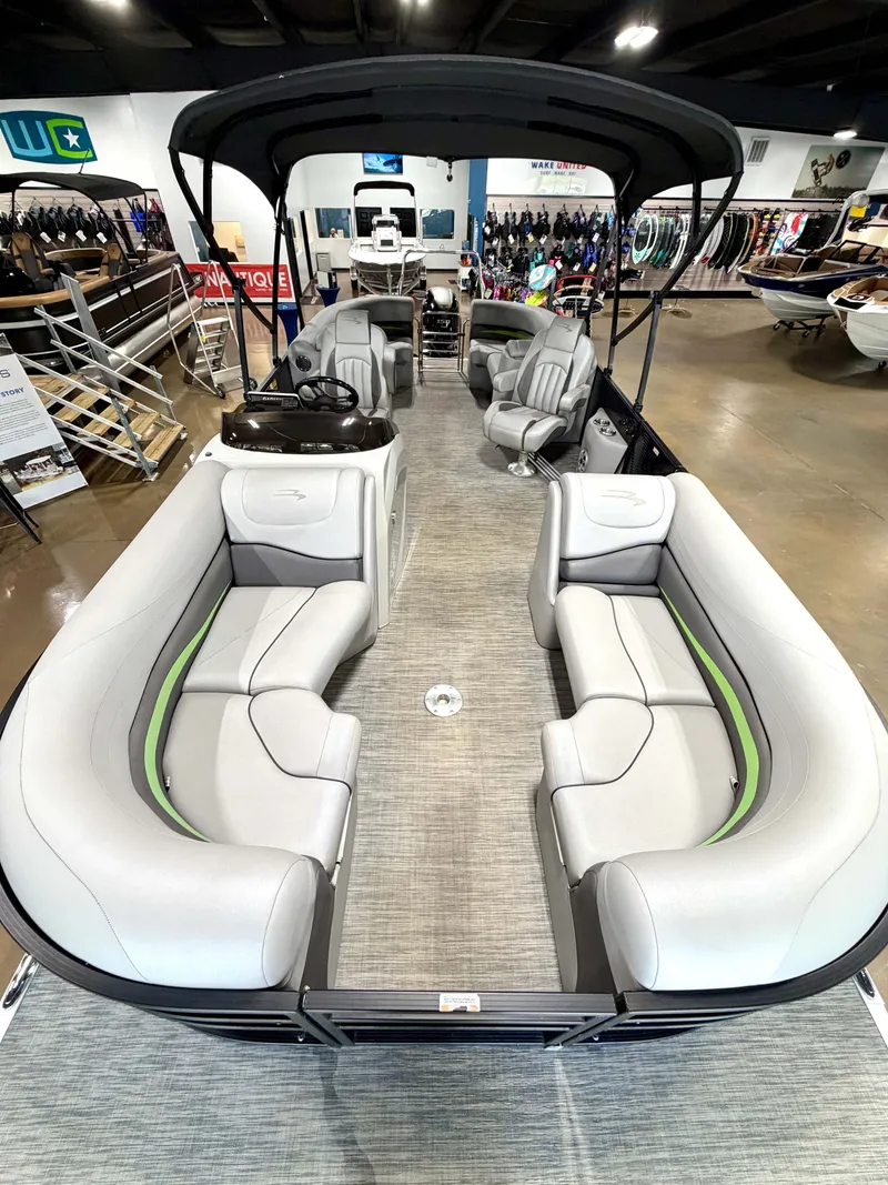 Slide: The Image of Interior view of a 2020 Bennington G22 pontoon boat in showroom. - 13