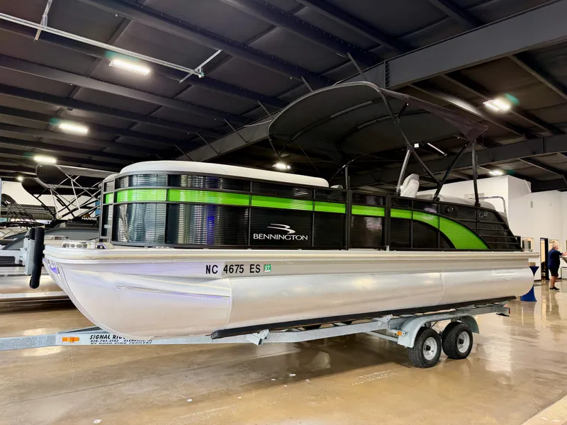 Slide: The Image of 2020 Bennington G22 pontoon boat indoors on a trailer. - 4