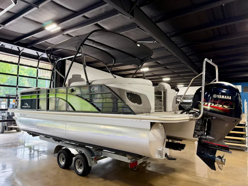 Slide: The Image of 2020 Bennington G22 pontoon boat with Yamaha engine in a garage. - 5