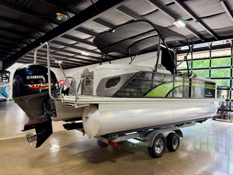 Slide: The Image of 2020 Bennington G22 pontoon boat with Yamaha engine in a showroom. - 6