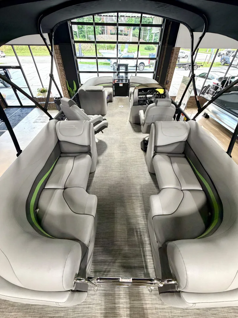 Slide: The Image of Interior of a 2020 Bennington G22 pontoon boat with gray seating. - 8