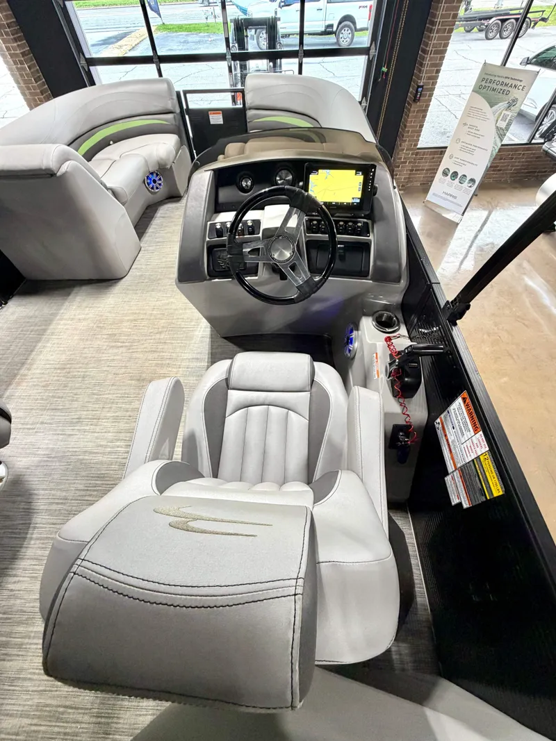 Slide: The Image of Interior of a 2020 Bennington G22 pontoon boat with helm console. - 9