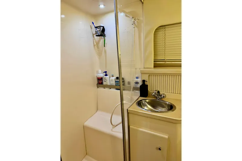 Slide: The Image of Bathroom interior of 1998 Carver 355 Aft Cabin Motor Yacht with shower and sink. - 21