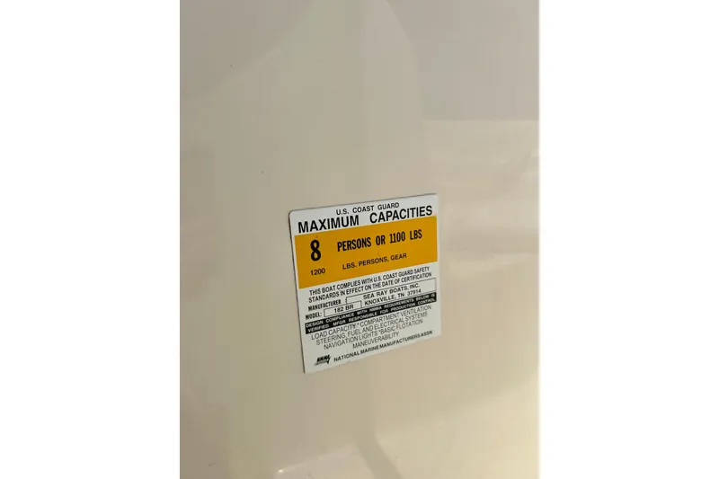 Slide: The Image of 2001 Sea Ray 182 Bow Rider capacity label, max 8 persons or 1100 lbs. - 19