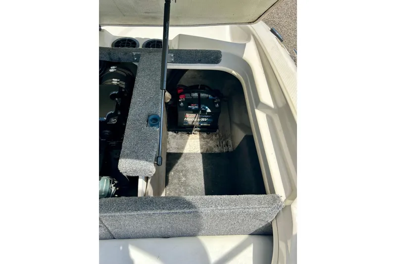 Slide: The Image of Open engine compartment of 2001 Sea Ray 182 Bow Rider boat. - 31