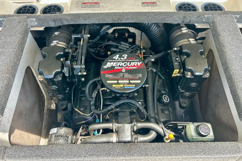 Slide: The Image of Engine compartment of a 2001 Sea Ray 182 Bow Rider with Mercury MerCruiser 4.3L engine. - 4