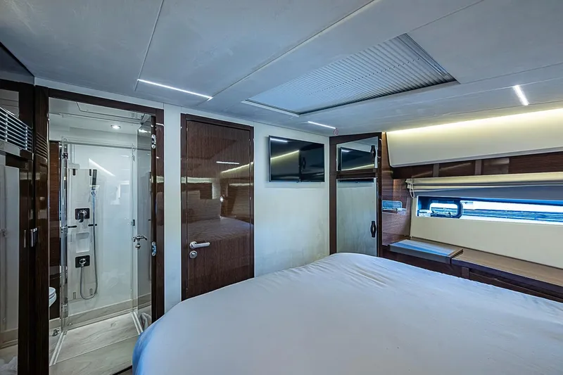 Slide: The Image of Luxurious interior of 2021 Prestige 520 yacht with modern bedroom and ensuite bathroom. - 32