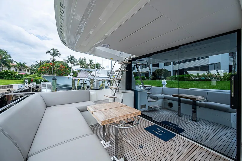Slide: The Image of Luxurious 2021 Prestige 520 yacht with spacious outdoor seating and elegant design. - 48