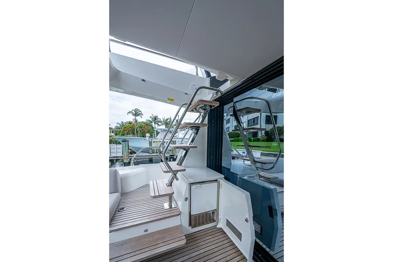 Slide: The Image of Staircase on 2021 Prestige 520 yacht with sleek design and modern amenities. - 50