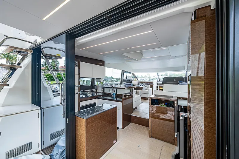 Slide: The Image of Luxurious interior of a 2021 Prestige 520 yacht, featuring modern design and spacious layout. - 59