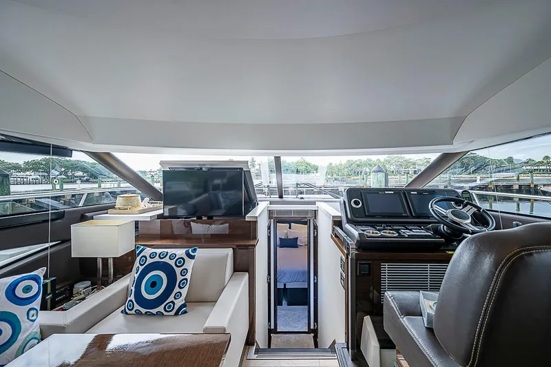 Slide: The Image of Luxurious interior of 2021 Prestige 520 yacht with modern helm and stylish seating. - 60