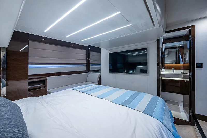 Slide: The Image of Luxurious 2021 Prestige 520 yacht bedroom with modern design and sleek finishes. - 70