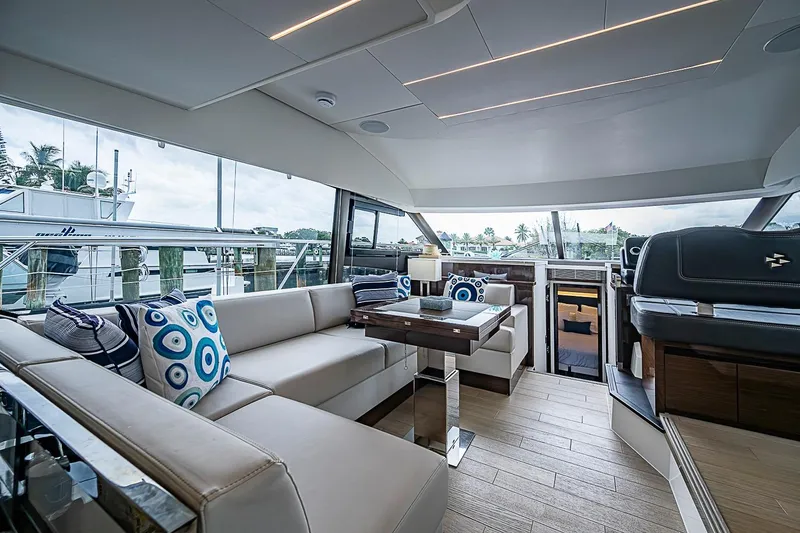 Slide: The Image of Luxurious interior of 2021 Prestige 520 yacht with modern seating and elegant decor. - 25