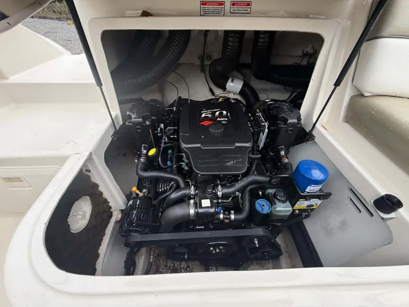Slide: The Image of Engine compartment of a 2006 Sea Ray 200 SD boat. - 11