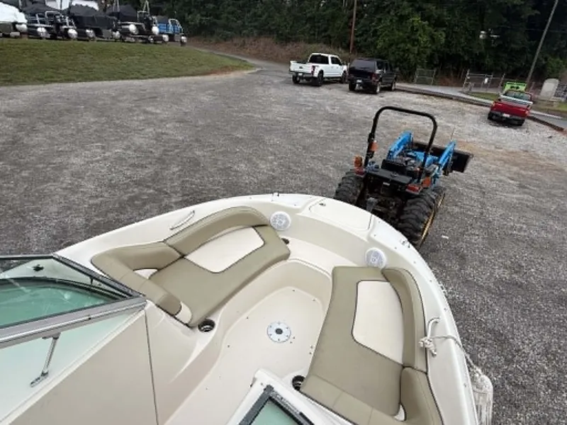 Slide: The Image of 2006 Sea Ray 200 SD boat on trailer with tractor. - 20
